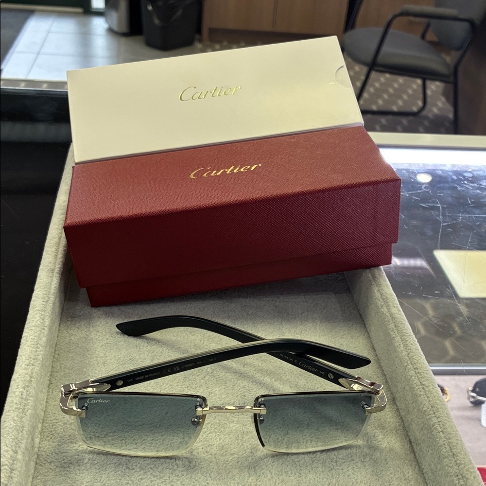 Cartier Silver and Black Rimless Eyewear